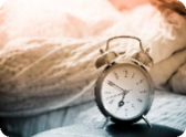alarm clock next to bed