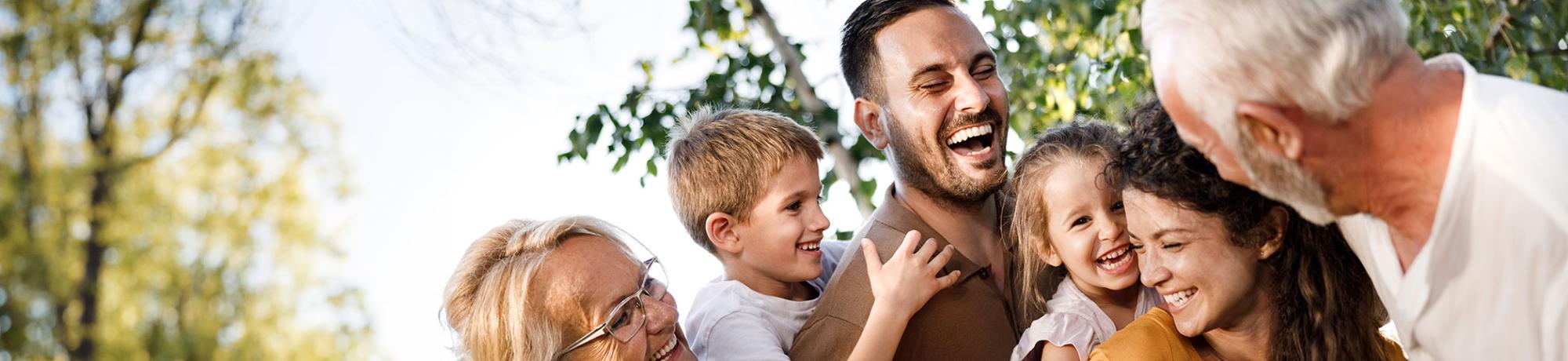 a happy family showers attention on their youngest member